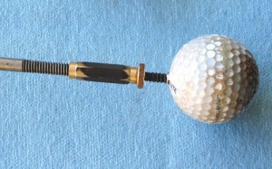 Photo #6: Step two is screw something into the ball and give it a yank. Went to the gun store and spent a few bucks for a ball puller; i.e. something with a pointy screw on the front end and a #10-32 threaded back end. Made the rest myself, rather than pay $21 more (!!!) for a simple T-handle rod. Got the ball out on the first yank: very gratifying!